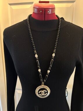 CHANEL Black Beaded Long Necklace with Crystal CC Medallion